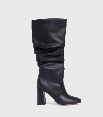 Knee high slouch store boots with heel