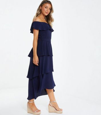 Navy bardot knot 2024 front dip hem dress