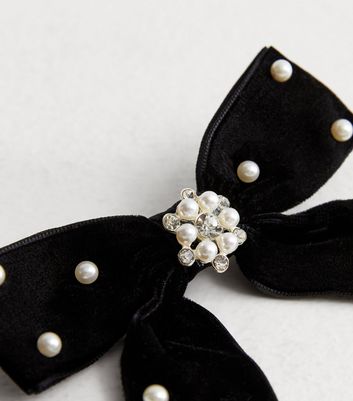 ASOS DESIGN bow hair clip with pearls in black velvet