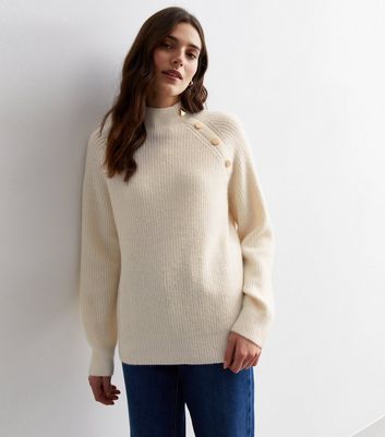 Jumper with gold top buttons