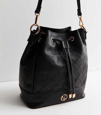 Black drawstring bucket bag best sale