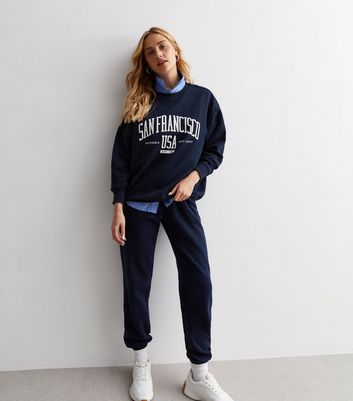 Navy blue hot sale sweatshirt outfit