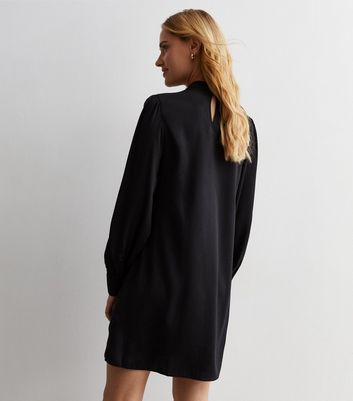 Tunic dress outlet meaning