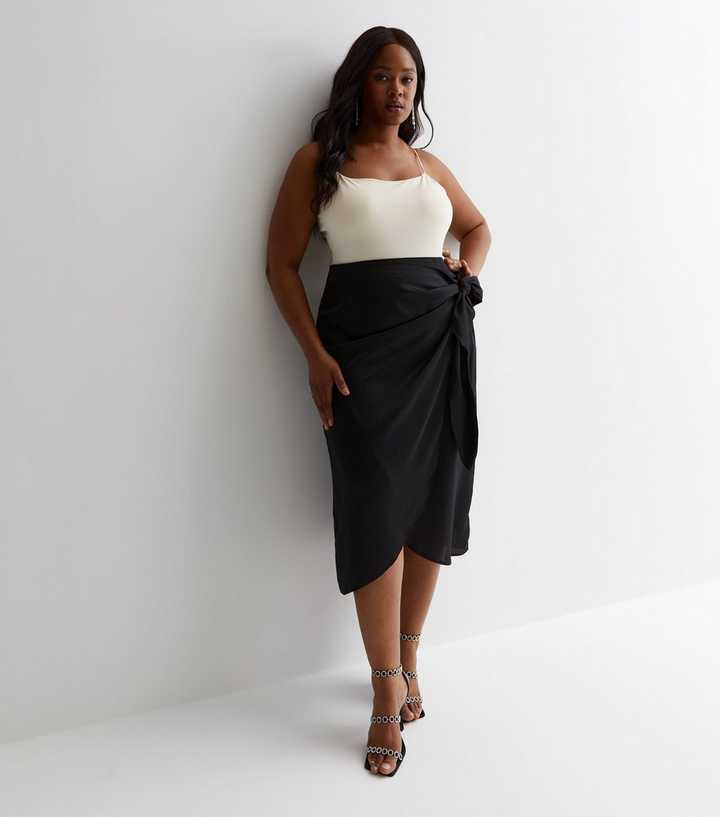 https://media3.newlookassets.com/i/newlook/880612901/womens/clothing/swimwear/curves-black-satin-sarong-midaxi-skirt.jpg?strip=true&qlt=50&w=720