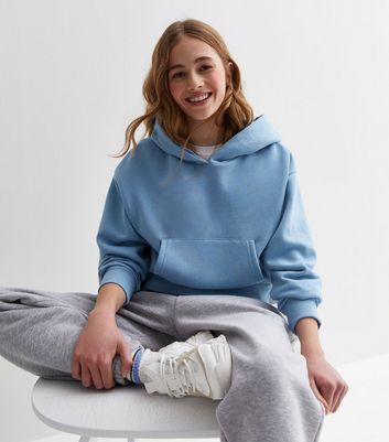 Girls Pale Blue Pocket Front Crop Hoodie New Look