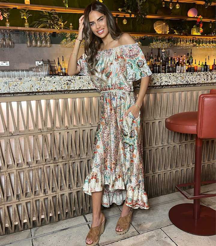green floral boho dress Manoella Floral Maxi Dress in Green main image 0