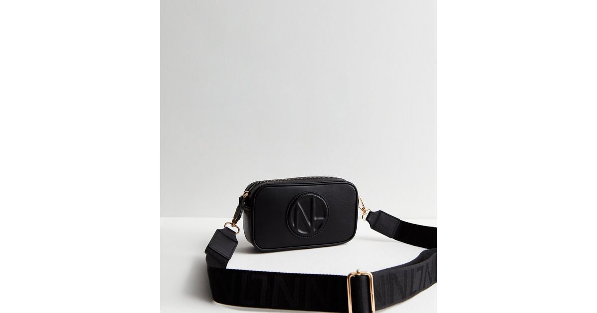 Black LeatherLook Embossed Camera Cross Body Bag New Look