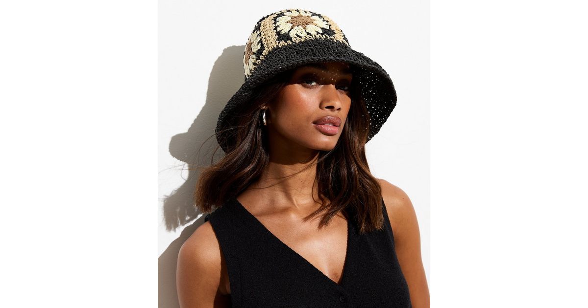 Black Flower Straw Effect Packable Bucket Hat New Look