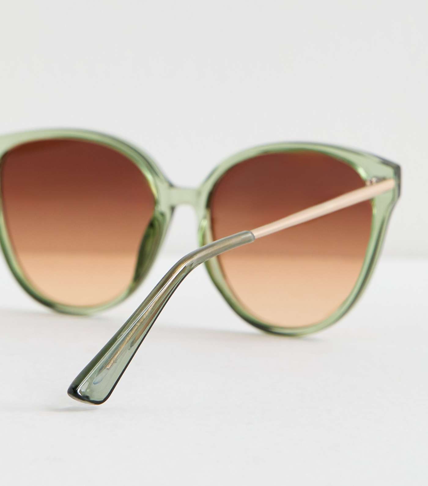Green Trim Round Sunglasses Image 4