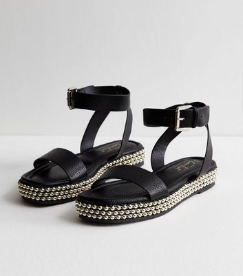 Black store studded flatforms