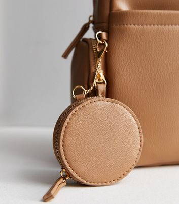 Camel backpack outlet purse