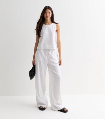 White wideleg trousers by chlo on sale