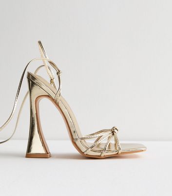 Gold knot outlet heels