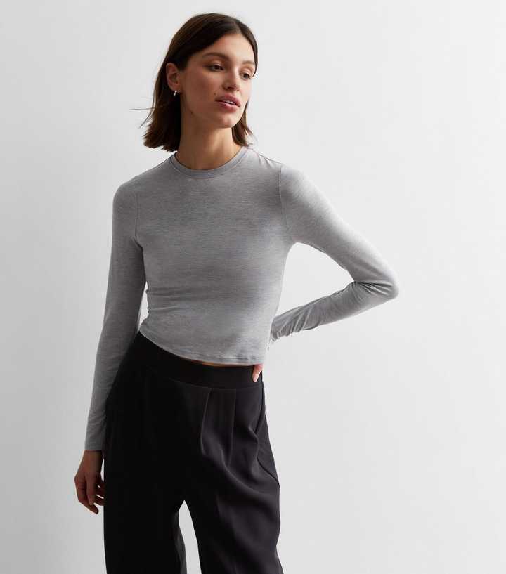 https://media3.newlookassets.com/i/newlook/886767804/womens/clothing/tops/grey-slinky-long-sleeve-top.jpg?strip=true&qlt=50&w=720
