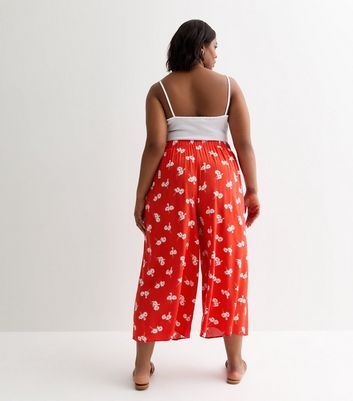 Curves Red Ditsy Floral Print Cropped Trousers New Look