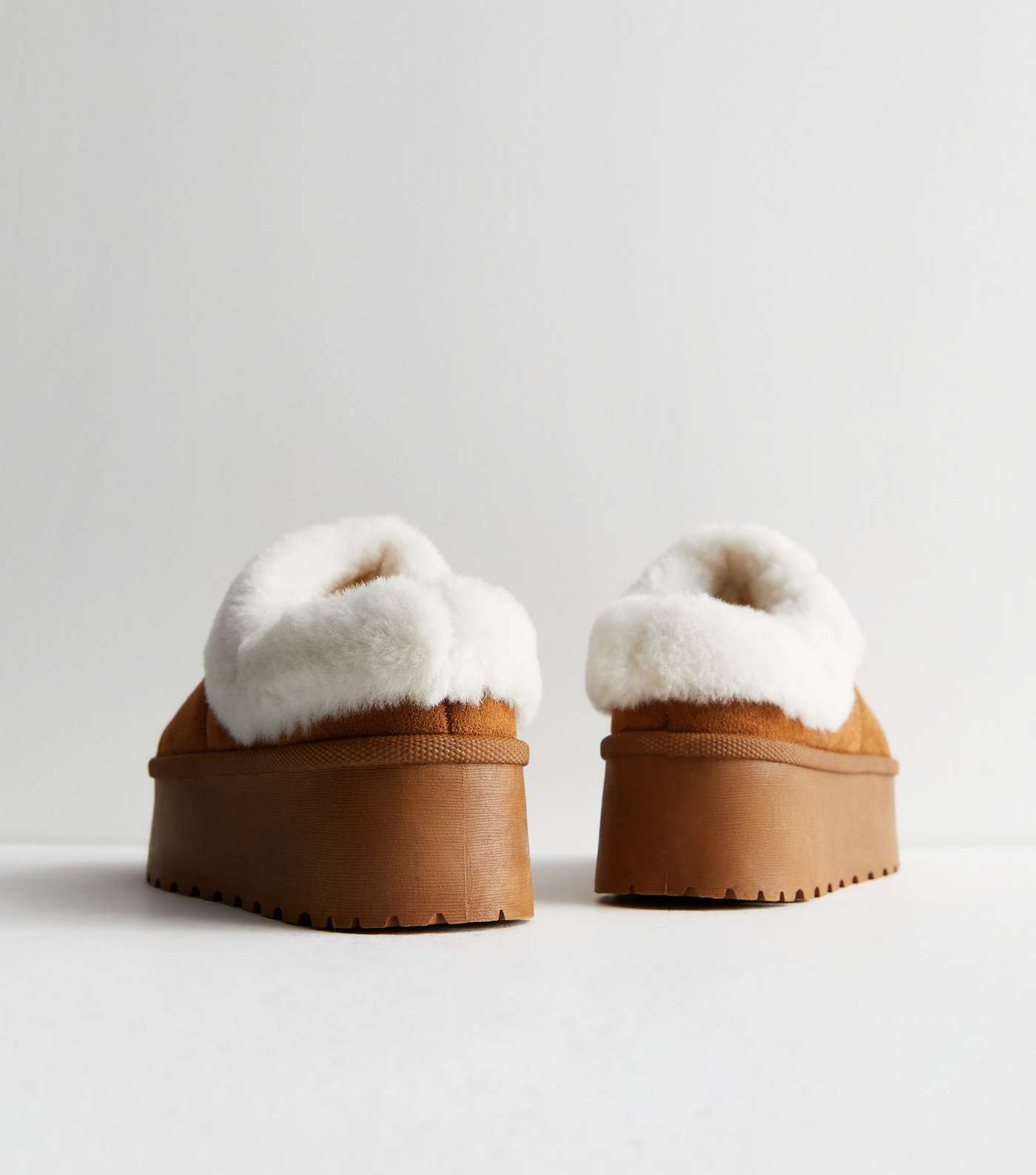 Truffle Collection faux fur thong slippers in gray - ShopStyle