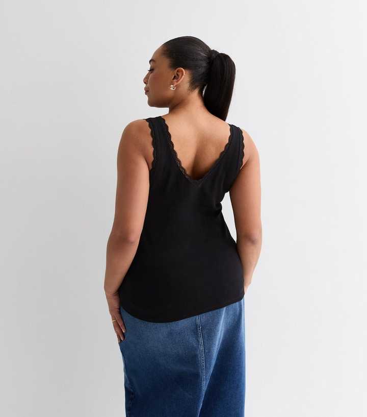 https://media3.newlookassets.com/i/newlook/889067801M3/womens/clothing/tops/curves-black-v-neck-lace-trim-vest.jpg?strip=true&qlt=50&w=720