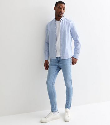 dress shirt and skinny jeans