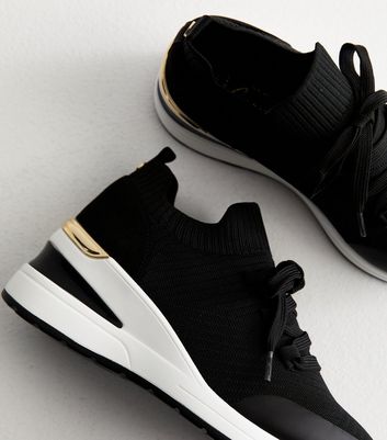 Black wide fit trainers online