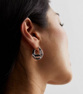 New beaten silver dangle oval earrings *** non tarnish (TNJ original) main image 0