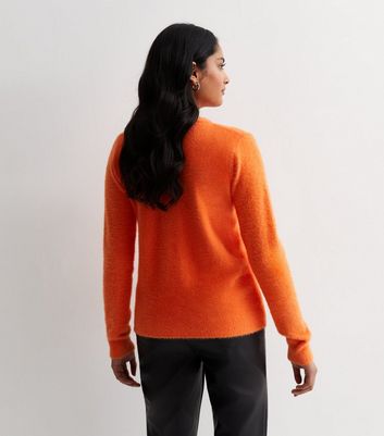 Blue and cheap orange jumper