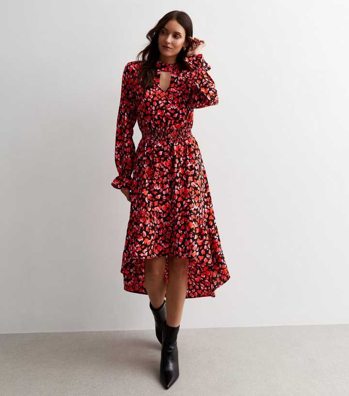 https://media3.newlookassets.com/i/newlook/890472369/womens/clothing/dresses/cutie-london-red-heart-print-keyhole-dip-hem-midi-dress.jpg?strip=true&qlt=50&w=720
