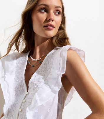 white frill sleeve blouse