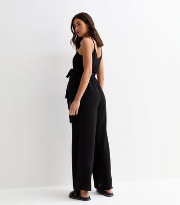 Black strappy jumpsuit on sale