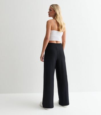 Black ribbed wide leg trousers hotsell