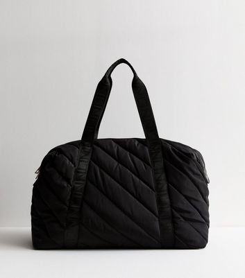 Black quilted duffle bag on sale