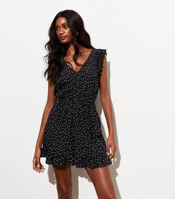 Black polka dot playsuit on sale