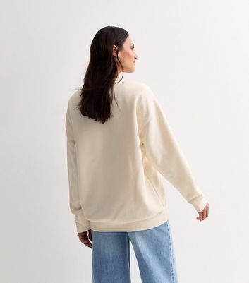 Cream Bow Print Cotton Sweatshirt New Look