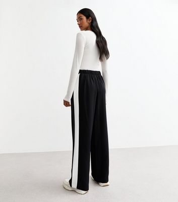 Black trousers with stripe down side on sale