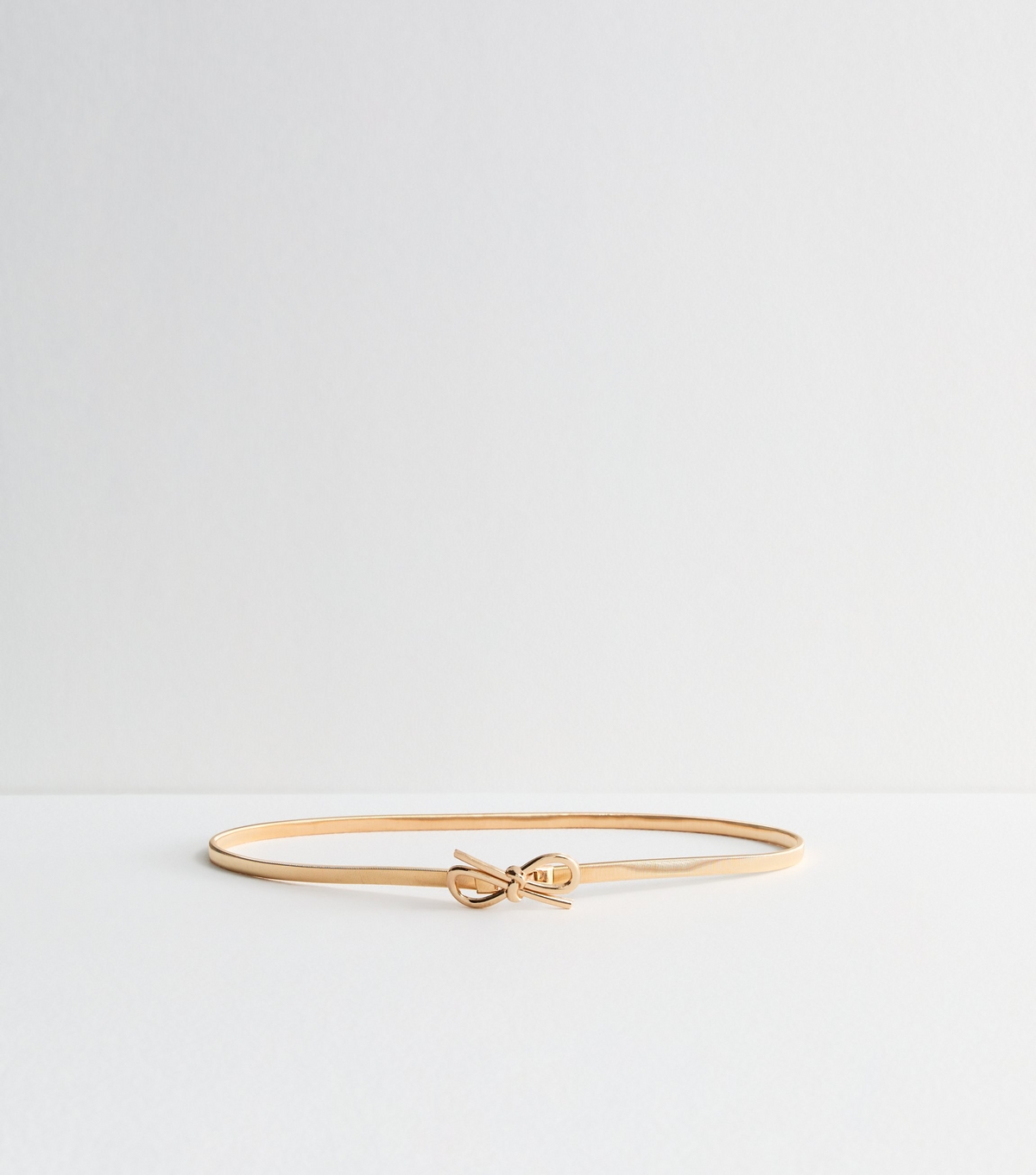 Gold Tone Bow Slinky Belt New Look