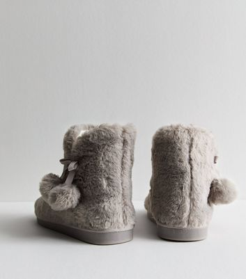 Faux fur pom pom boots best sale