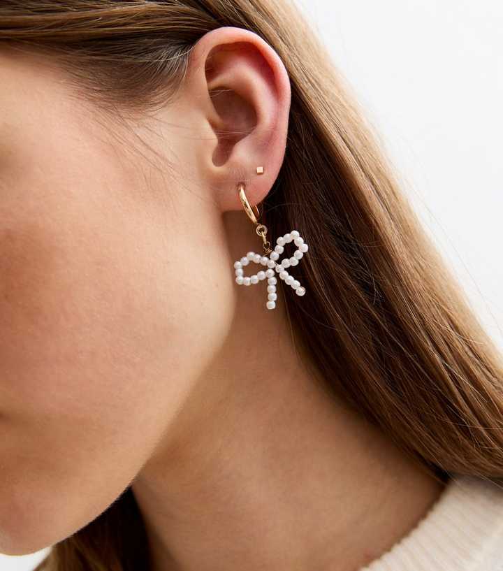 Gold Tone Pearl Bow Hoop Earrings 