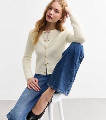 Cream Bow Button Ribbed Knit Cardigan