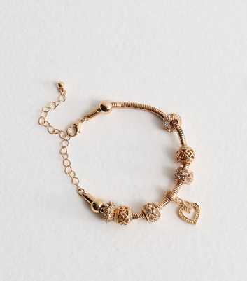 Gold Tone Charm Bracelet