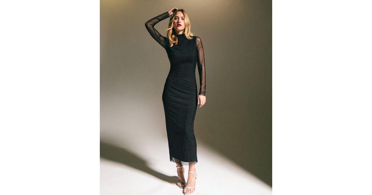 gray long sleeve dress outfit Bebe Women's Long Sleeve V-Neck Midi Sweater Dress, Size Medium in Gray Viscose main image 0