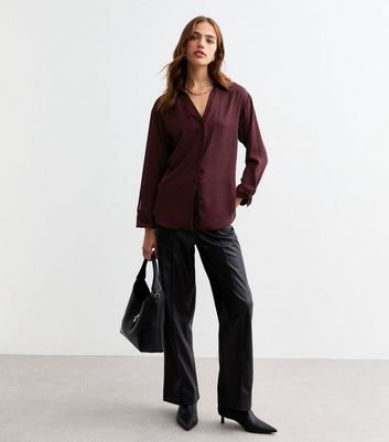 maroon polka dot shirt