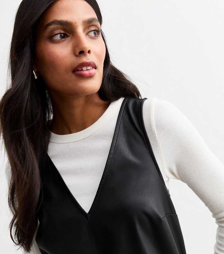 Black Faux Leather V Neck Mini Pinafore Dress | New Look Black Faux Leather V Neck Mini Pinafore Dress | New Look