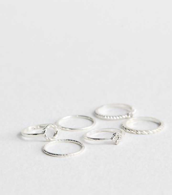 6 Pack of Silver Tone Flower Twist Diamanté Rings