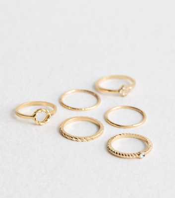 6 Pack of Gold Tone Flower Twist Diamanté Rings