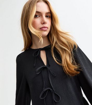 long sleeve black tie top