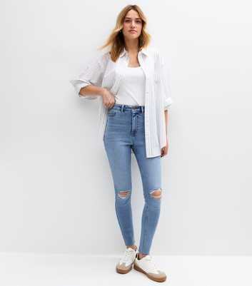 Blue Ripped Knee Slim Leg Jeans