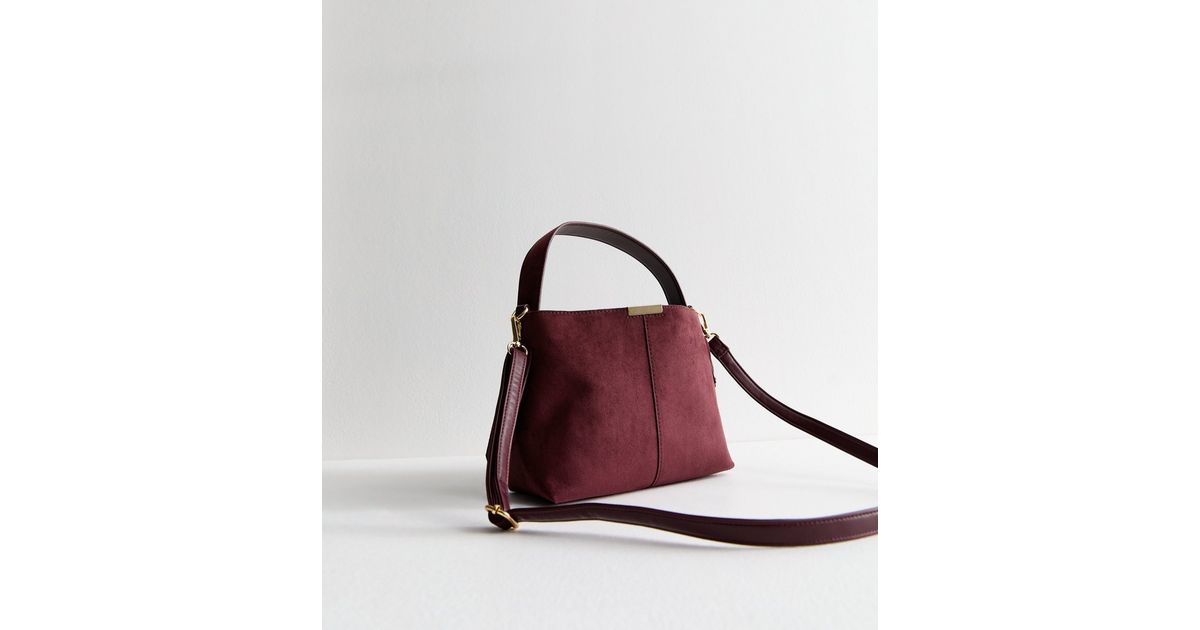 Emerald Buckle Accent Shoulder Bag