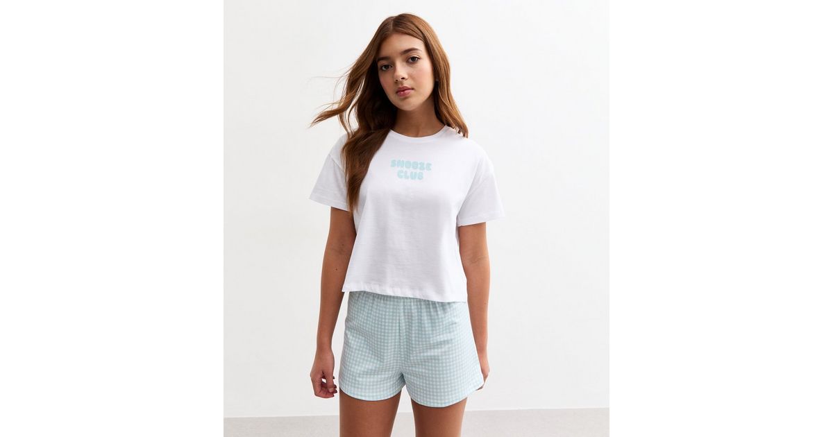 a young girl wearing pyjamas, similar to what Jannik Sinner might wear after a long match, highlighting the importance of rest and recovery for athletes like him