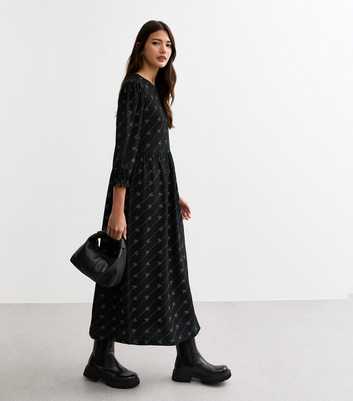 Black Bow Pattern Jersey Midi Smock Dress