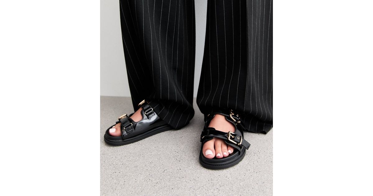 Wide Fit Black Faux Leather Buckled Strap Sandals | New Look