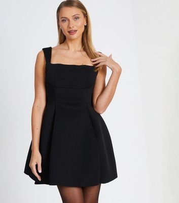 Black knee length skater dress best sale